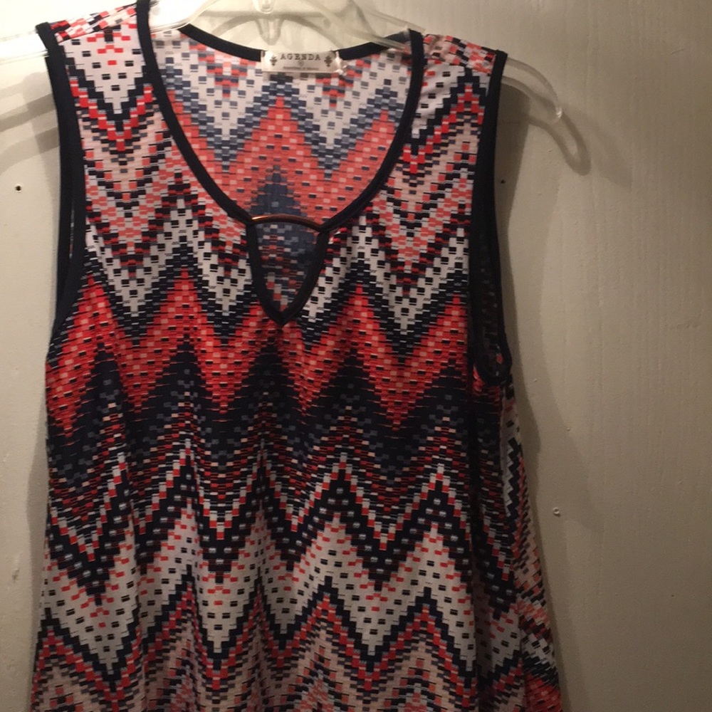 Sleeveless blouse gorgeous print